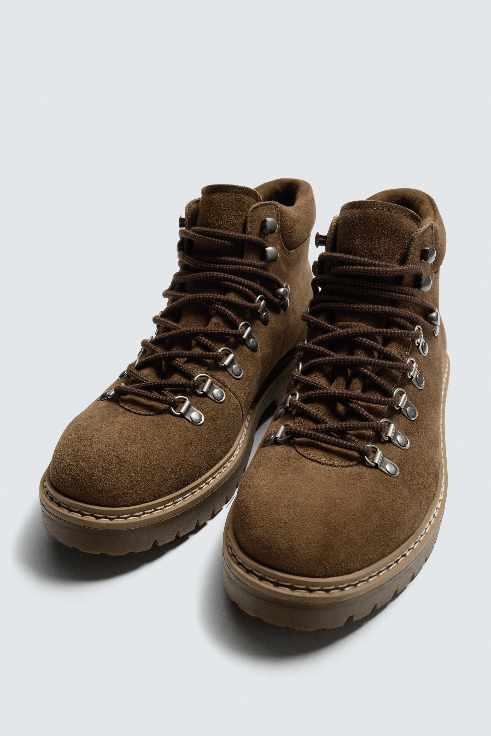 BOTTES EN CUIR À SEMELLES ÉPAISSES